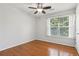 Bright bedroom featuring hardwood floors and natural light at 3850 Stepney Way, Cumming, GA 30041