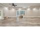 Open bonus room area with recessed lighting, patio access, and space for customization at 3850 Stepney Way, Cumming, GA 30041