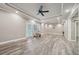 Bright bonus room enhanced by recessed lighting, a ceiling fan, and outdoor access at 3850 Stepney Way, Cumming, GA 30041