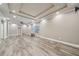Spacious bonus room with recessed lighting, offering potential for multiple uses and configurations at 3850 Stepney Way, Cumming, GA 30041