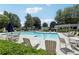 Community pool with lounge chairs and tables at 3850 Stepney Way, Cumming, GA 30041