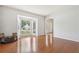 Bright living room with hardwood floors, large bay window and entry to the foyer at 3850 Stepney Way, Cumming, GA 30041