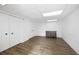 A finished basement with two closets and neutral decor offers flexible living space at 695 Hiram Sudie Rd, Dallas, GA 30157