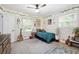 Charming bedroom featuring decor, carpet floors and a window at 695 Hiram Sudie Rd, Dallas, GA 30157