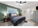 Comfortable bedroom with large windows, ceiling fan and carpeted floors at 695 Hiram Sudie Rd, Dallas, GA 30157