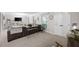 Bright living room featuring neutral walls, comfortable seating, and contemporary decor at 695 Hiram Sudie Rd, Dallas, GA 30157
