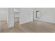 Bedroom featuring hardwood floors, closet, and one window with black trim at 115 Nova Lane, Roswell, GA 30075