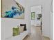 Bright hallway featuring a bench and modern artwork at 115 Nova Lane, Roswell, GA 30075