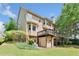 Spacious backyard featuring a multi-level deck, ideal for entertaining and enjoying the outdoors at 1415 Liberty Ln, Cumming, GA 30040