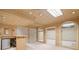 Finished basement featuring recessed lighting, a bar area, arched openings and storage at 1415 Liberty Ln, Cumming, GA 30040
