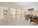 Spacious upstairs loft area with neutral carpet, stylish furniture, and ample natural light at 1415 Liberty Ln, Cumming, GA 30040