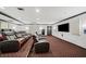 Comfortable home theater featuring tiered seating, a large screen, and dim lighting, perfect for movie nights at 1735 Peachtree Ne St # 117, Atlanta, GA 30309