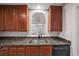 Galley-style kitchen with stainless steel appliances and granite countertops at 1735 Peachtree Ne St # 117, Atlanta, GA 30309