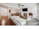 Bright and open floor plan with fireplace, hardwood floors, and large sectional at 1735 Peachtree Ne St # 117, Atlanta, GA 30309