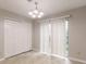 Bedroom with new flooring, closet and sliding glass doors at 2191 Phillips Rd, Lithonia, GA 30058