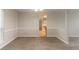 Dining area with new neutral carpet and bright lighting, perfect for Gathering meals and entertaining at 2191 Phillips Rd, Lithonia, GA 30058