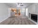 Inviting living room with fireplace and easy access to the kitchen at 2191 Phillips Rd, Lithonia, GA 30058