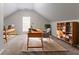 Bright and spacious home office featuring multiple desks and ample storage space at 2191 Phillips Rd, Lithonia, GA 30058