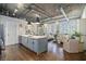 Modern kitchen flowing into the living room, creating an airy and inviting atmosphere, complete with island at 3235 Roswell Ne Rd # 402, Atlanta, GA 30305