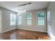 Dining room with hardwood floors and lots of natural light at 2482 Brittany Park Ln, Ellenwood, GA 30294