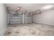 Two car garage featuring a large interior space with two garage doors and automatic openers at 2482 Brittany Park Ln, Ellenwood, GA 30294