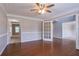 Spacious living room with hardwood floors and lots of natural light at 2482 Brittany Park Ln, Ellenwood, GA 30294