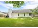 Well-maintained lawn in the back yard with a patio and grill, perfect for outdoor entertaining at 2870 Jay Oak Dr, Dacula, GA 30019