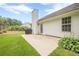 Inviting backyard with a patio, well-maintained lawn, and mature landscaping at 2870 Jay Oak Dr, Dacula, GA 30019