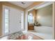 Welcoming entryway with hardwood floors flowing into a carpeted seating area at 2870 Jay Oak Dr, Dacula, GA 30019