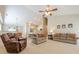 Spacious living room with open layout, fireplace, and neutral decor at 2870 Jay Oak Dr, Dacula, GA 30019