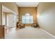 Spacious carpeted living room with two armchairs and a view of the front door at 2870 Jay Oak Dr, Dacula, GA 30019