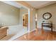 Open living room featuring hardwood floors, carpet, and neutral wall colors at 2870 Jay Oak Dr, Dacula, GA 30019