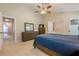 Spacious main bedroom featuring a large closet, neutral carpet, and ensuite bathroom at 2870 Jay Oak Dr, Dacula, GA 30019