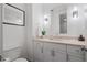 Chic powder room features a vanity with a marble countertop, modern fixtures, and stylish lighting at 3630 Peachtree Ne Rd # 2309, Atlanta, GA 30326