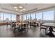 Spacious dining area features hardwood floors and panoramic windows with city views at 3630 Peachtree Ne Rd # 2309, Atlanta, GA 30326
