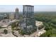 Contemporary high-rise with modern design, nestled among trees and nearby buildings at 3630 Peachtree Ne Rd # 2309, Atlanta, GA 30326