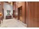 Hallway featuring elevator access and sophisticated wood paneling at 3630 Peachtree Ne Rd # 2309, Atlanta, GA 30326