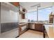 Modern kitchen with stainless steel appliances and a stunning city view at 3630 Peachtree Ne Rd # 2309, Atlanta, GA 30326