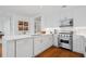 Bright, modern kitchen features sleek white cabinets, marble countertops, and stainless steel appliances at 3630 Peachtree Ne Rd # 2309, Atlanta, GA 30326