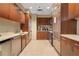 Modern kitchenette area featuring stainless steel appliances and plenty of cabinet space at 3630 Peachtree Ne Rd # 2309, Atlanta, GA 30326