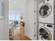 Stackable washer and dryer conveniently located next to the open-concept living space with stunning city views at 3630 Peachtree Ne Rd # 2309, Atlanta, GA 30326