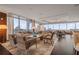 Open-concept living room boasts large windows offering stunning city views at 3630 Peachtree Ne Rd # 2309, Atlanta, GA 30326
