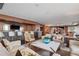 Beautiful lounge with modern bar area, fireplace, and plush seating at 3630 Peachtree Ne Rd # 2309, Atlanta, GA 30326