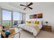 Serene main bedroom with balcony access, modern furnishings, and city views at 3630 Peachtree Ne Rd # 2309, Atlanta, GA 30326