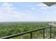 Expansive view from the balcony overlooking lush greenery and the cityscape, perfect for relaxing and enjoying the scenery at 3630 Peachtree Ne Rd # 2309, Atlanta, GA 30326
