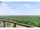 Balcony showcases expansive views of lush greenery and city skyline, ideal for relaxing and entertaining at 3630 Peachtree Ne Rd # 2309, Atlanta, GA 30326