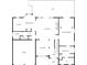 First floor plan featuring a kitchen, breakfast nook, living room, primary bedroom, laundry, dining area, garage, and porch at 1058 Magnolia Dr, Villa Rica, GA 30180