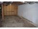 Spacious unfinished basement offering potential for customization, featuring bare concrete floors and exposed ceiling elements at 157 Sequoyah Cir, Canton, GA 30115