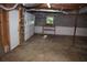 Spacious unfinished basement has concrete floors, overhead ductwork, and some windows, offering potential for customization at 157 Sequoyah Cir, Canton, GA 30115