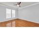 Bedroom with a ceiling fan, hardwood floors and window for natural light at 1850 Cotillion Dr # 3123, Atlanta, GA 30338